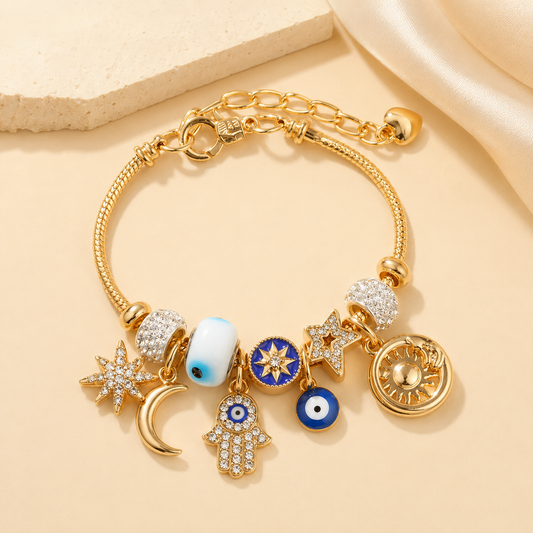 Celestial Charm Bracelet – Gold-Tone Evil Eye, Sun, Moon & Star Layered Charm Bracelet