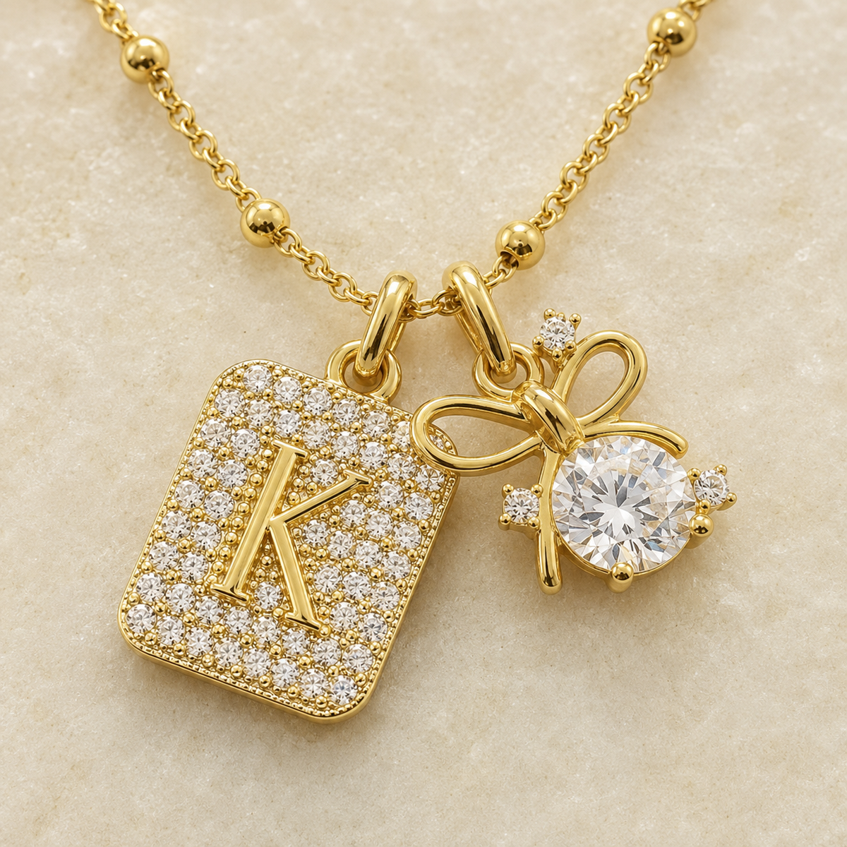 Gold Initial & Bow Charm Necklace