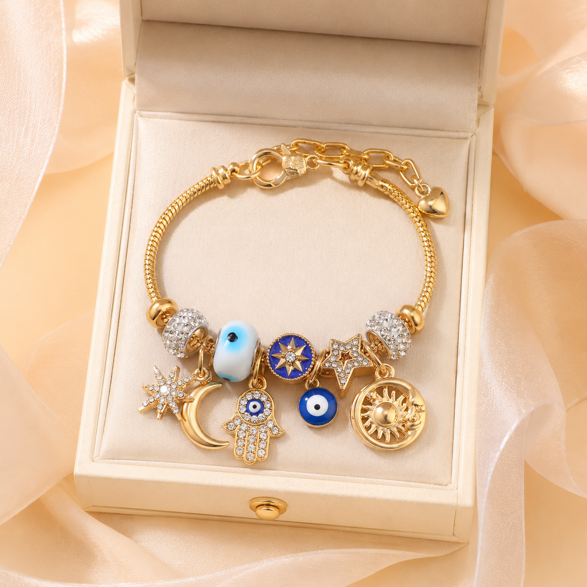 Celestial Charm Bracelet – Gold-Tone Evil Eye, Sun, Moon & Star Layered Charm Bracelet