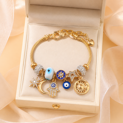 Celestial Charm Bracelet – Gold-Tone Evil Eye, Sun, Moon & Star Layered Charm Bracelet