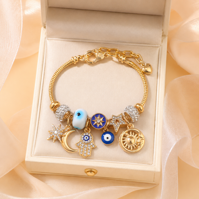Celestial Charm Bracelet – Gold-Tone Evil Eye, Sun, Moon & Star Layered Charm Bracelet Main Image