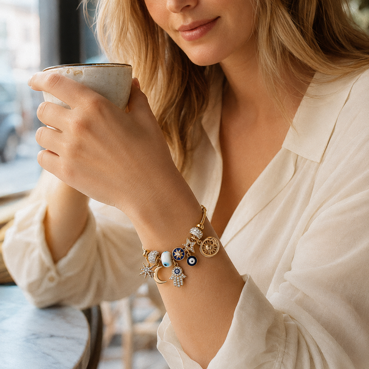 Celestial Charm Bracelet – Gold-Tone Evil Eye, Sun, Moon & Star Layered Charm Bracelet