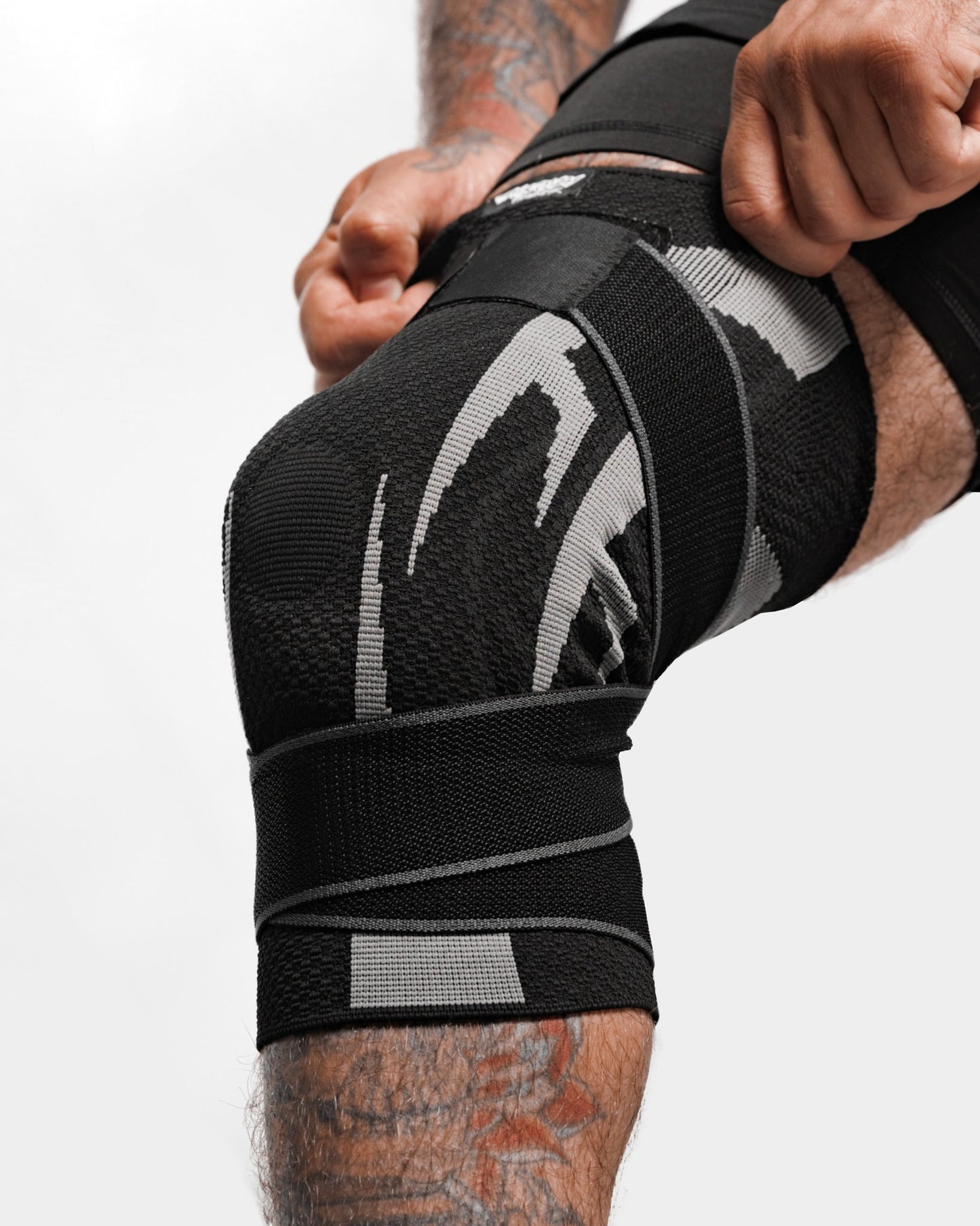 Unisex Knitted Knee Brace with Spring Stabilizers & Dual Straps – Compression Support for Knee Pain Relief and Injury Recovery