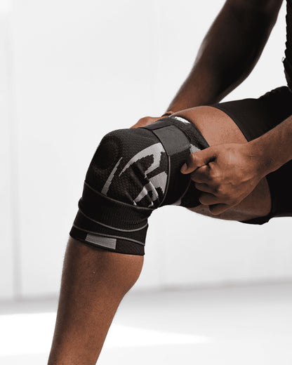 Unisex Knitted Knee Brace with Spring Stabilizers & Dual Straps – Compression Support for Knee Pain Relief and Injury Recovery